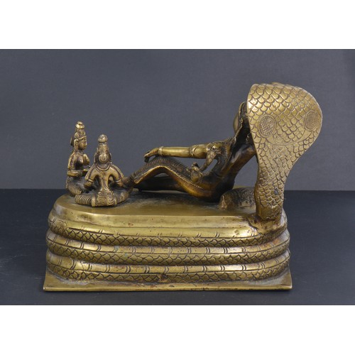 372 - An Indian Cast Brass study of a reclining 