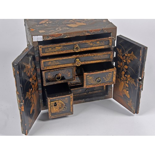 376 - A 17th/18th Century Japanese Lacquered & Decorated 18th Century Table Cabinet with a fitted interior... 