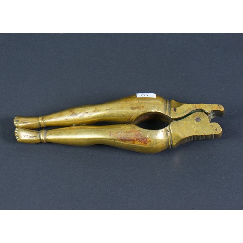 422 - A pair of Antique Cast Brass Nut Crackers designed as a Pair of Ladies Legs.