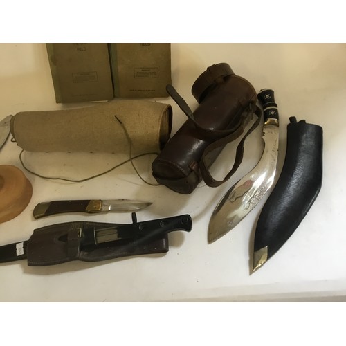 570 - A WWII Bayonet Jungle Type, Clip Lever, Bakelite Handle contained in a Leather Case, Two Kukri's, a ... 