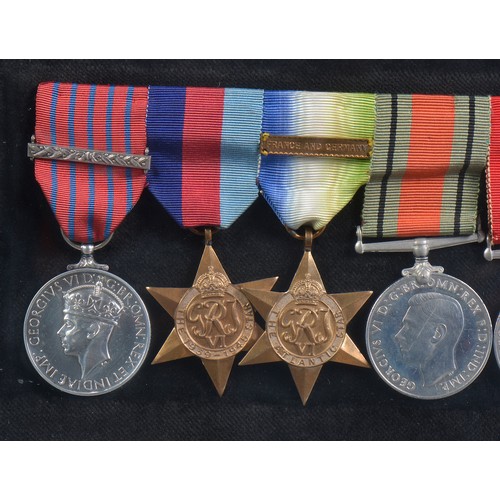 575 - A Framed Set of WWII Medals to include The George Medal (Laurel Leaf Bar), Atlantic (France & German... 