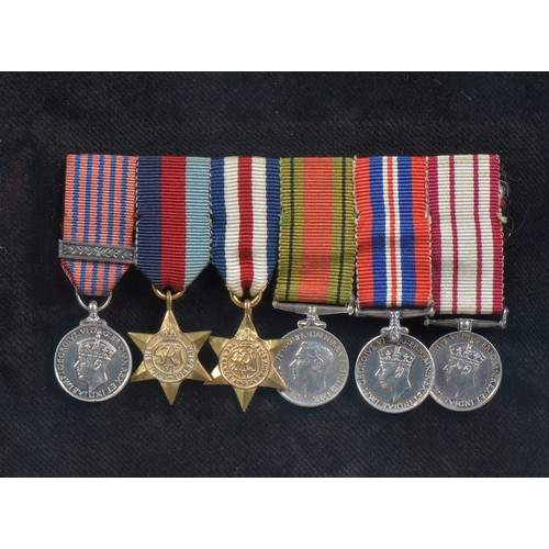 575 - A Framed Set of WWII Medals to include The George Medal (Laurel Leaf Bar), Atlantic (France & German... 