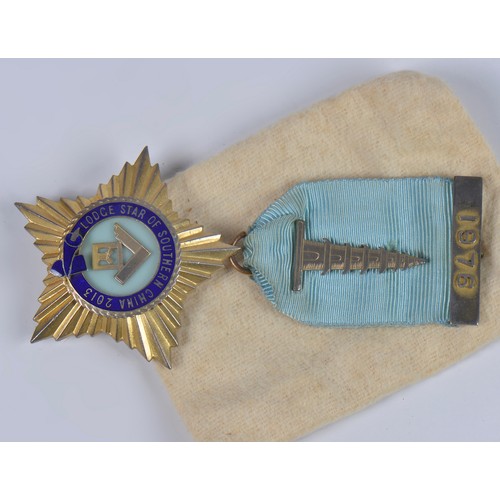 576 - A Free Masonry Medal for the Lodge Star of Southern China dated 1976-2013.