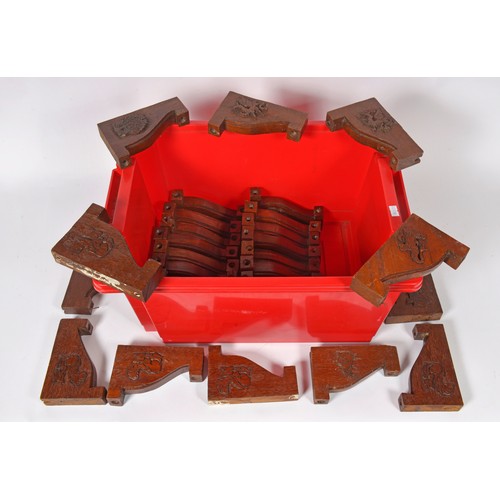 587 - A Collection of 30 x Pub Carved Wood Shelving Brackets of shaped form. Measuring: 10cms x 15cms.