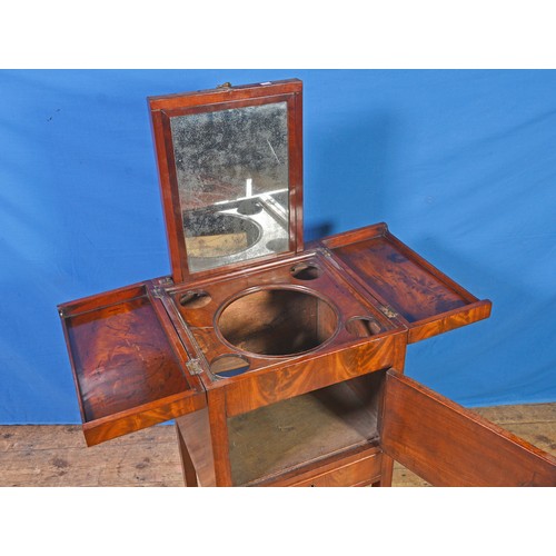 646 - A Georgian Cuban Flame Veneered Mahogany, Twin Fold-Over Topped Wash Stand with a fitted interior, S... 