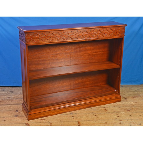 648 - A Modern Mahogany Bookcase with a Blind Fret Top & adjustable Shelves. Measuring: 131cms across x 31... 