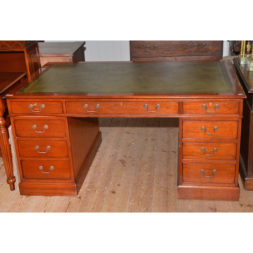 649 - A Victorian design Oak Pedestal desk with fitted Drawers & a Gilt Leather Top. Measuring: 153cms acr... 