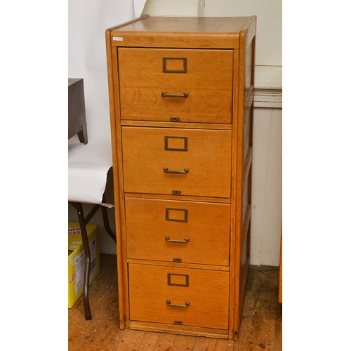 661 - A Vintage 1930s Four Drawers Oak Filing Cabinet with panelled sides. Measuring: 54cms across x 71cms... 