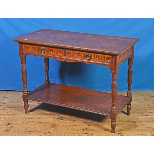 668 - A Victorian Mahogany Two Drawers Table with Ring Pull Handles & Turned Columns. Measuring: 102cms ac... 