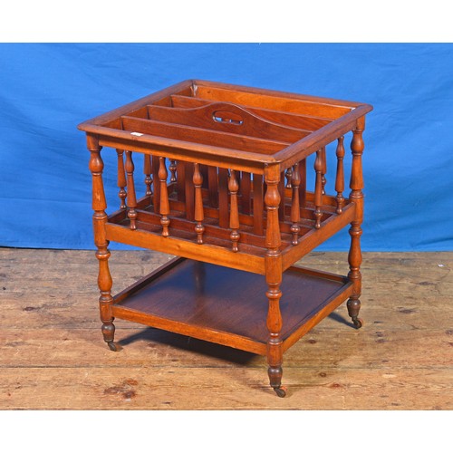 679 - A Victorian Mahogany & Chestnut Canterbury Stand with under tier & resting on Turned legs & Castors.... 