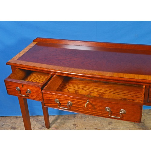 685 - A Mahogany & Laburnum Cross Banded Serving Table fitted with Three Drawers. Measuring: 122cs across ... 