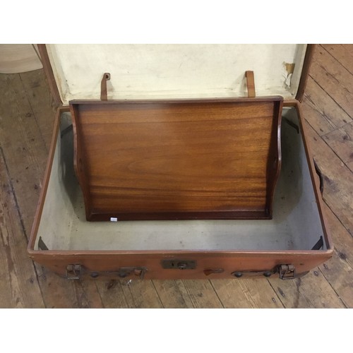 707 - An Antique Leather & Corner Trunk with Catches & Lever patent. Measuring: 49cms deep x 77cms across ... 