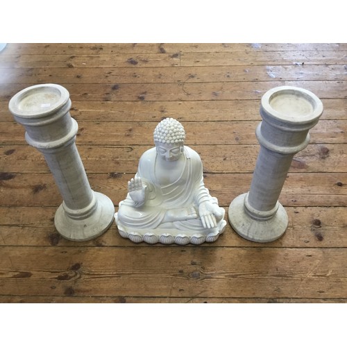 970 - A Study in White of a Seated Bhudda & Two Garden Candle Holders.