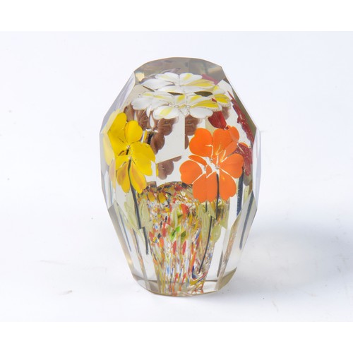 975 - An interesting Nailsea Glass Dump Weight with faceted Shape & Summer Flowers. Measuring: 11cms high.