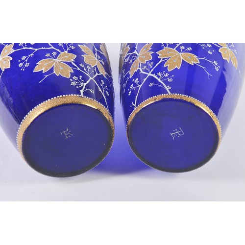 992 - A Pair of Czechoslovakian Blue ground Floral Gilt decorated & enamelled Vases, possibly Harrach. Mea... 