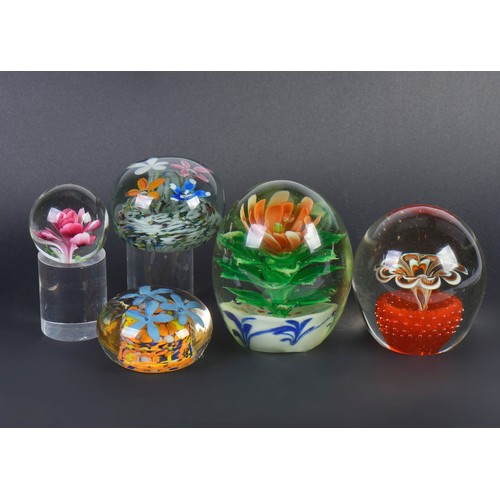 995 - Five various Glass paperweights Dumps decorated with internal flowers.