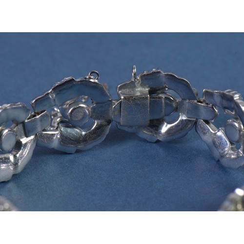 175 - A 1940s Silver & Paste Set Horseshoe shaped Bracelet.