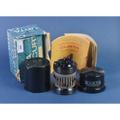 604 - A Curta Calculator No: 543846. Type 11. Made in Liechtenstein. System Curt Herstark in Original Case... 