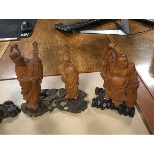 344 - Four Chinese Boxwood Carvings of Taoist immortals, a Mandolin Lady, Darfur, etc on Original Stands. ... 