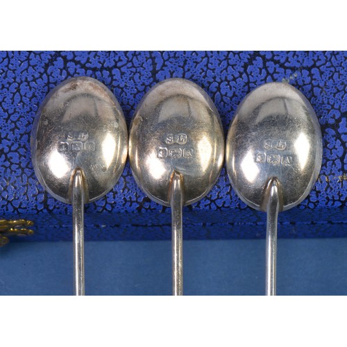 5 - A Set of Six Bean Handled Silver Coffee Spoons in Case along with an Empty Case.