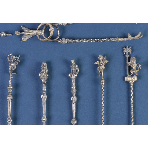 6 - A Collection of Italian Tea Spoons with embossed Bowls & Apostle & Animal Tops.