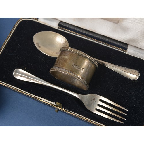 21 - A Child's Silver Egg Cup & Silver Spoon & one other Christening Set in boxes. Weighing: 98 grams.