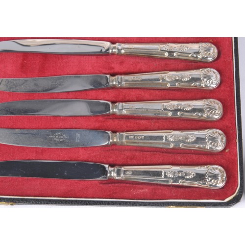 23 - A Set of Six King's pattern Silver Handled Table Knives & a Set of Four Silver Tea Spoons in Cases. ... 