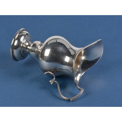 27 - A Georgian designed Silver Helmet Shaped Cream Jug. Weighing: 92 grams.