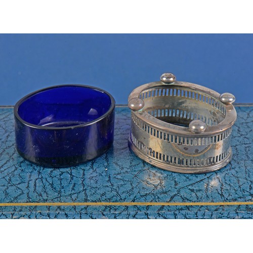 33 - A Three Piece Silver pierced Cruet Set with Blue Glass Liners by the Northern Goldsmiths Company in ... 