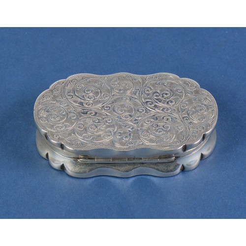 56 - A Victorian Silver engraved & shaped Snuff Box. Birmingham Y. Weighing: 84 grams.