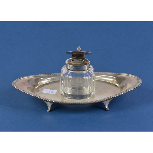 62 - A Silver Navette shaped Ink Stand with Glass Bottle. Weighing: 109 grams.