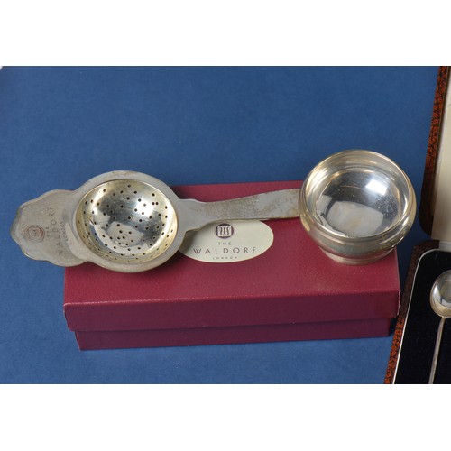 68 - A Set of Six Silver Bean Handled Tea Spoons & a Waldorf Hotel Tea Strainer with Base & Box.