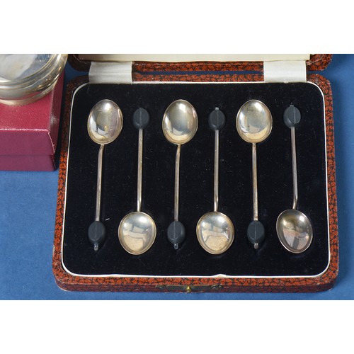 68 - A Set of Six Silver Bean Handled Tea Spoons & a Waldorf Hotel Tea Strainer with Base & Box.