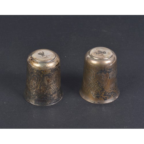 75 - A Pair of Russian Silver Vodka Tots with engraved decoration, marked 84BC1870 - St. George. Weighing... 