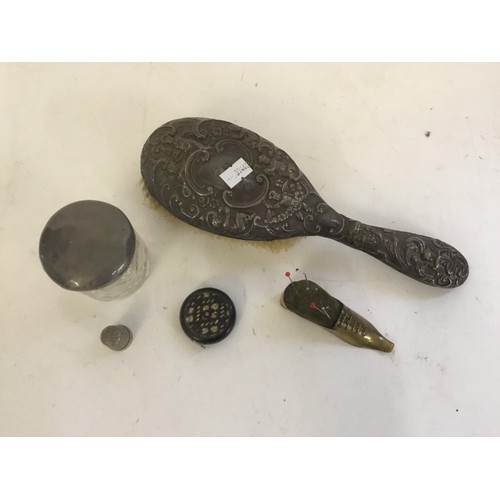 77 - A Silver Hand Brush, a Silver Trinket Box, Pin Cushion designed as a Boot, Thimble, Tape Measure, et... 