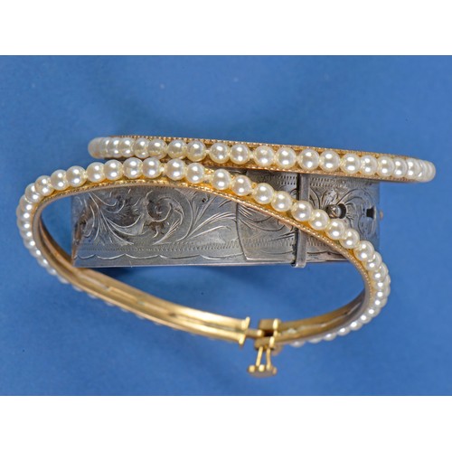 207 - A Silver Bangle, a Pearl Bangle & an Indian Pearl mounted Bride's Bangle.