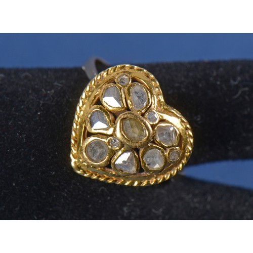 219 - An Indian Gold Ring in the shape of a Heart mounted with Rose cut Diamonds. Size: Q. Weighing: 4.6 g... 