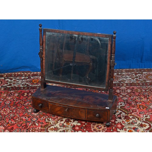 518 - A Regency Swing Frame Dressing Toilet Mirror in Figured Cuban Mahogany fitted with three Drawers. Me... 