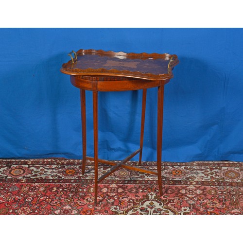 524 - A Kidney shaped Victorian inlaid Side Table resting on square swept out legs & cross stretchers alon... 