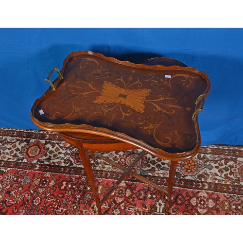 524 - A Kidney shaped Victorian inlaid Side Table resting on square swept out legs & cross stretchers alon... 