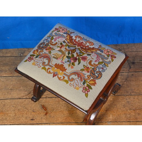 537 - A Regency design Rosewood Stool with a Needlework Seat. Measuring: 44cms x 38cms x 36cms high.