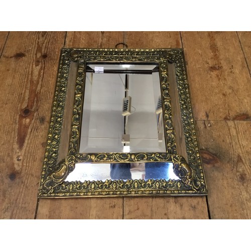 586 - A Napoleon III Repoussé Brass Cushion shaped mirror for an Entrance Hall to shine light in Embossed ... 