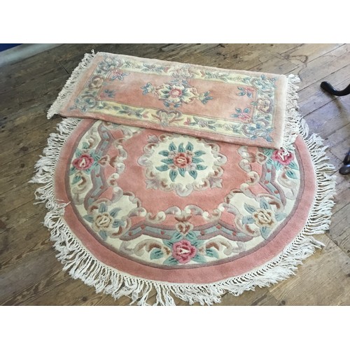 595 - A Circular Salmon Pink ground Floral decorated Cut & Shaped Central Medallion Rug. Measuring: 130cms... 