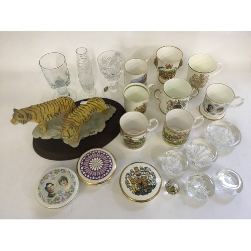 745 - A Collection of Commemorative Bone China Mugs, Powder Boxes, Paper Weights & a Resin Tiger Group.