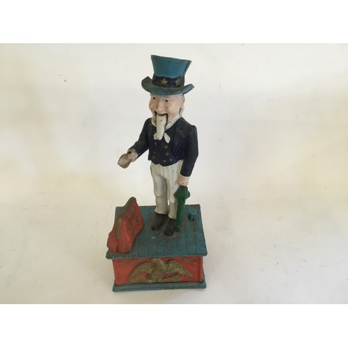 796 - An Uncle Sam Cast Iron & Painted Money Box.