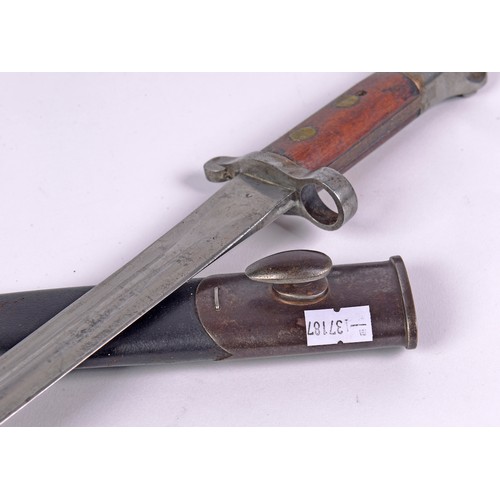 969 - A WWI Steel mounted Bayonet in a Leather Scabbard.