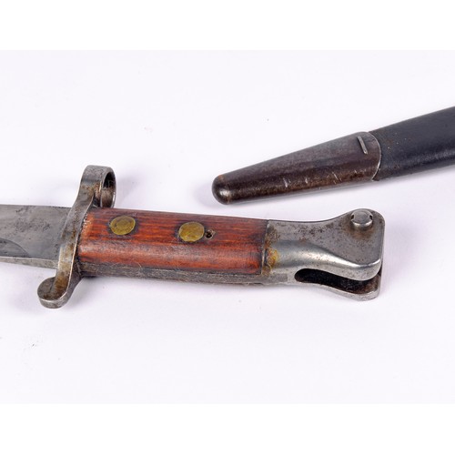 969 - A WWI Steel mounted Bayonet in a Leather Scabbard.