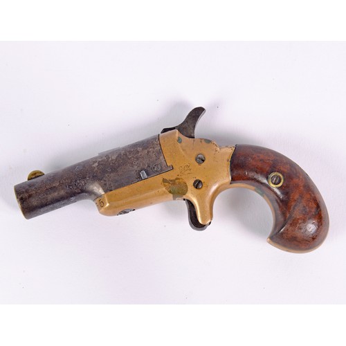 973 - A 19th Century Percussion Colt Muff Pistol.