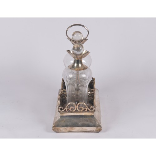25 - A Lovely Late Victorian Silver Whisky Decanter Stand with a Loop Handle & Wirework decoration contai... 