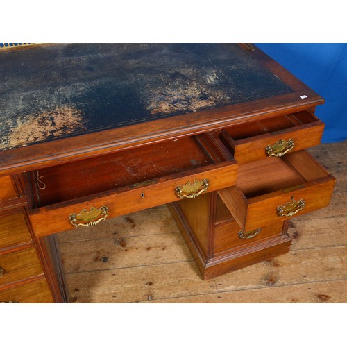 524 - A Victorian Mahogany Pedestal Desk fitted with three graduated Drawers over a bank of three drawers,... 